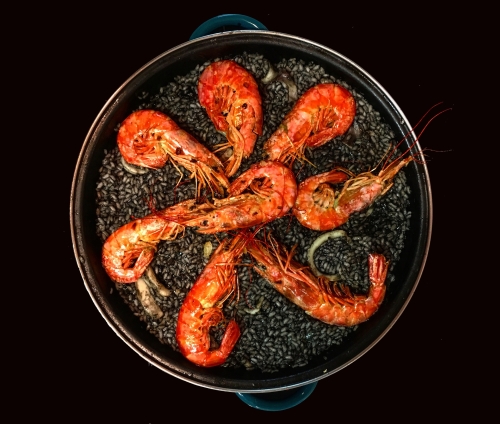 Arroz Negro con Langositons y Chipirones